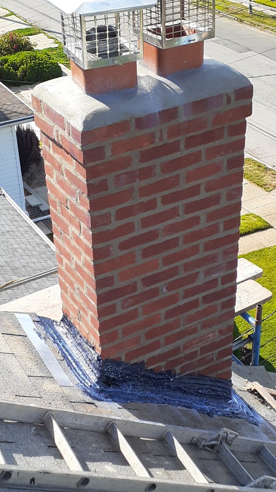 Brick chimney with mesh caps